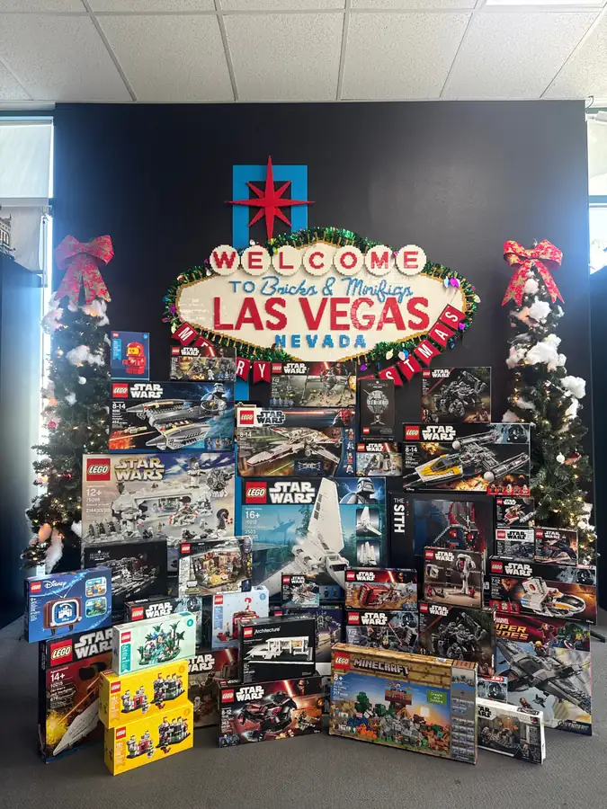 Boxed LEGO® sets arranged below the Las Vegas store sign for Black Friday.